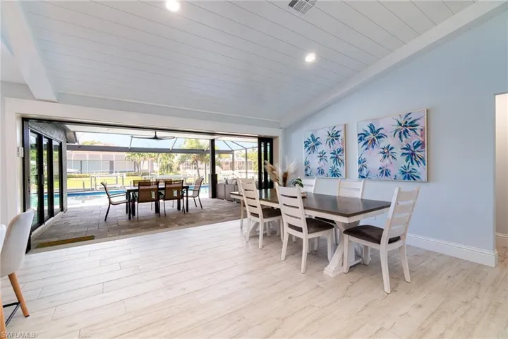 Dining area 16 foot sliders to lanai.