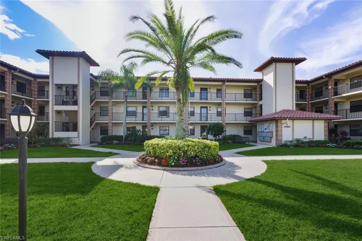 View of property's community featuring a lawn