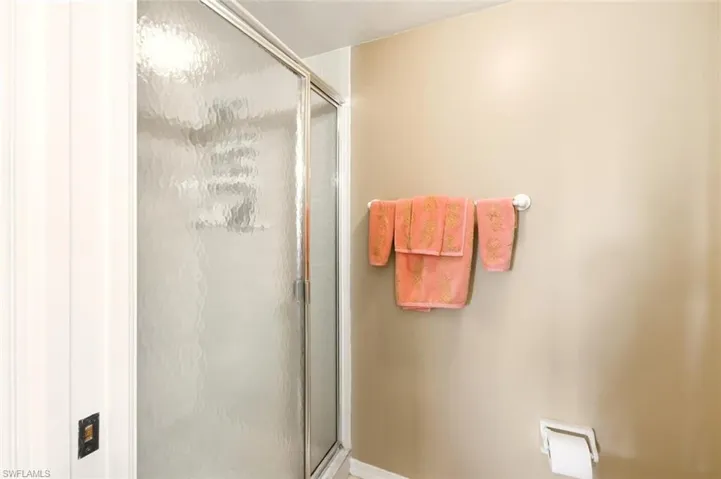 Bathroom featuring a shower stall