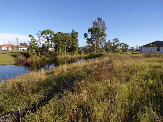 View of local wilderness with a nearby body of water