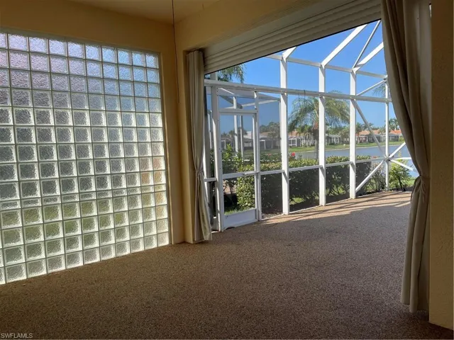 Lanai with glass brick wall on one side