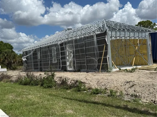 Under construction photos showing steel frame construction