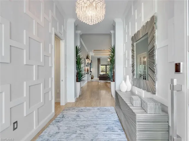 Front Entry with Custom Wall Treatment and Crystal Chandelier