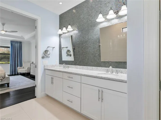 Primary Bathroom With Custom Tile Wall and Custom Mirrors