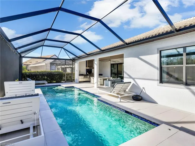 Custom Saltwater Pool With Water Feature - Covered Lanai