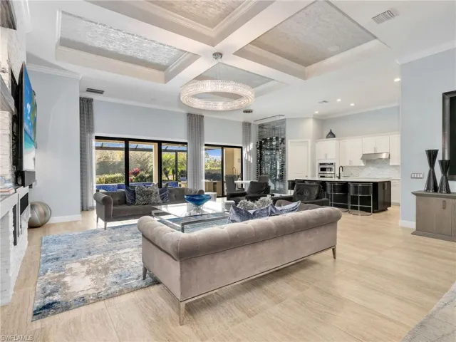 Great Room, Custom Tile & Glass Wine Wall, Kitchen with Large Island, Walk-In Pantry, Stainless Steel KitchenAid Appliances, Built In Refrigerator, and Eat In Kitchen
