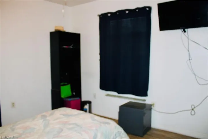 Bedroom featuring hardwood / wood-style flooring