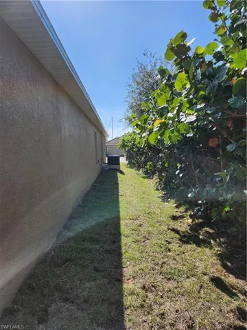 View of yard featuring central AC