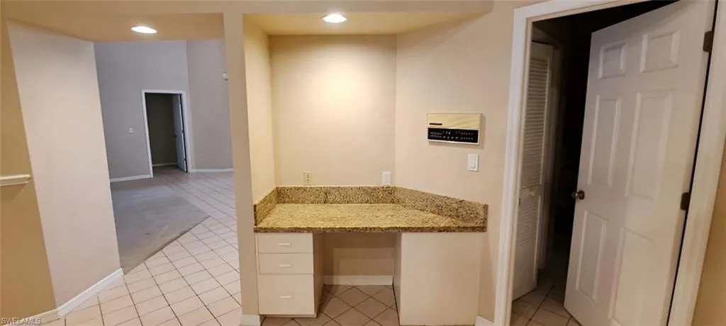 Bathroom with tile patterned floors