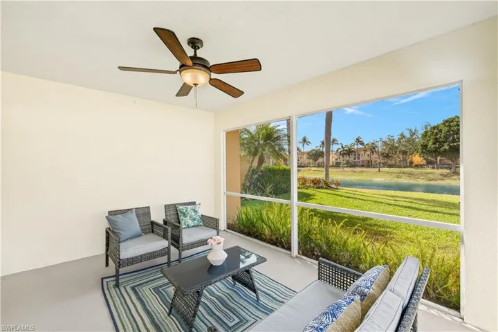 Sunroom / solarium with outdoor lounge area and a ceiling fan