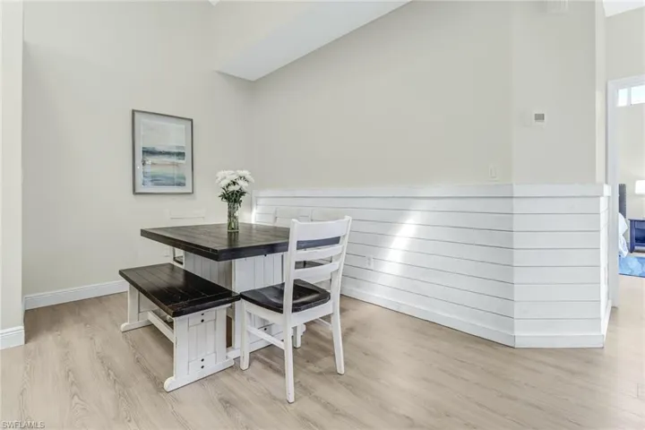 Dining space featuring light wood finished floors and baseboards