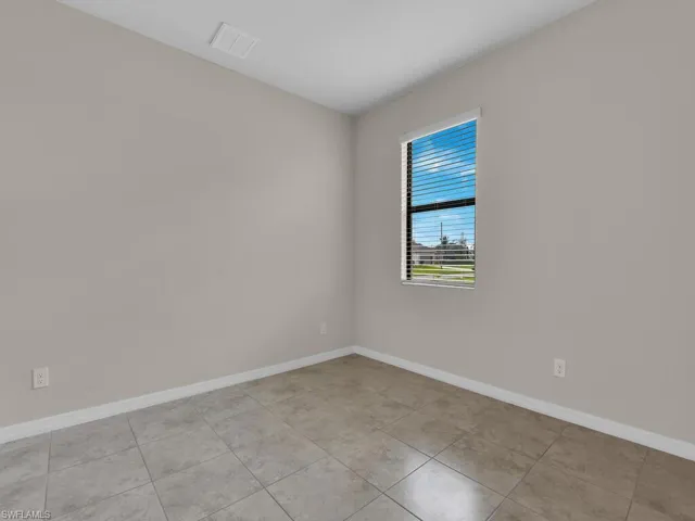 View of tiled spare room