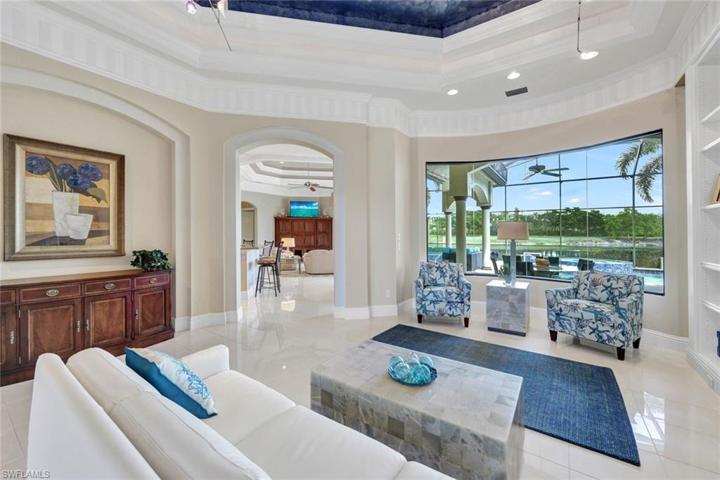 Large windows bring the outside tropical oasis inside.