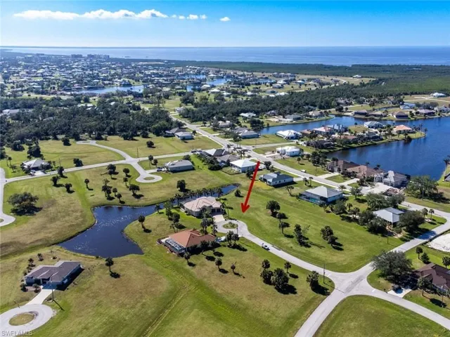 View of property location with a large body of water