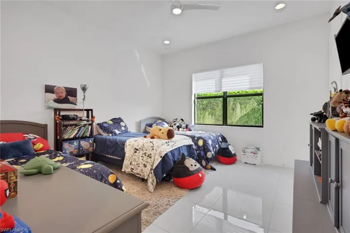 Large first floor bedroom #3 with its own full bath and custom-built closet