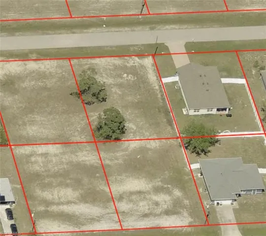 Aerial map of property and surrounding area with property parcel outlined