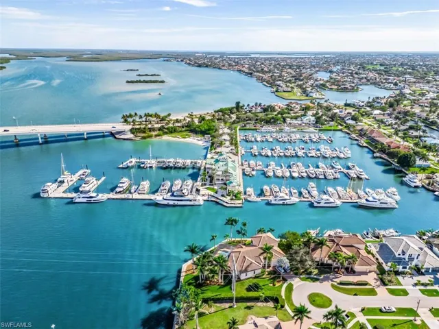 Bird's eye view of a marina and a nearby body of water
