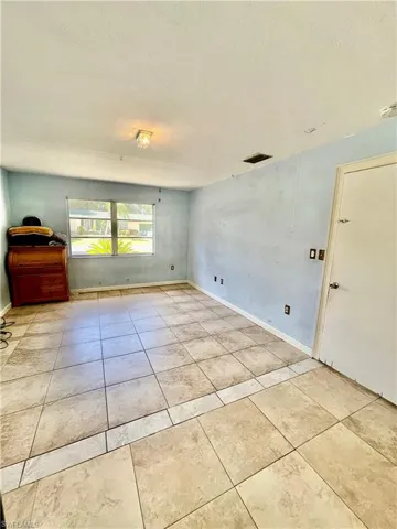 Master bedroom with walk in closet space.