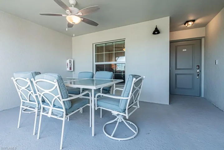 View of patio / terrace with ceiling fan and outdoor dining area