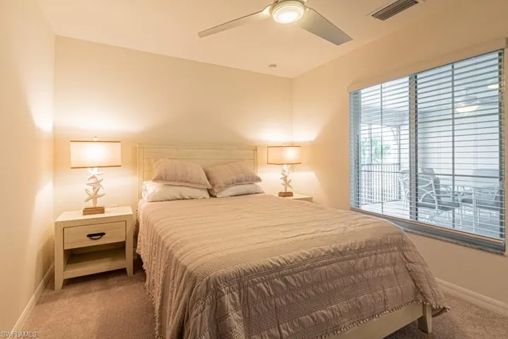 Bedroom featuring carpet flooring and ceiling fan