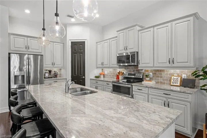 Custom granite counters, tile backsplash