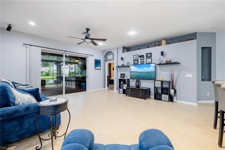 Living room with glass sliding doors to lanai