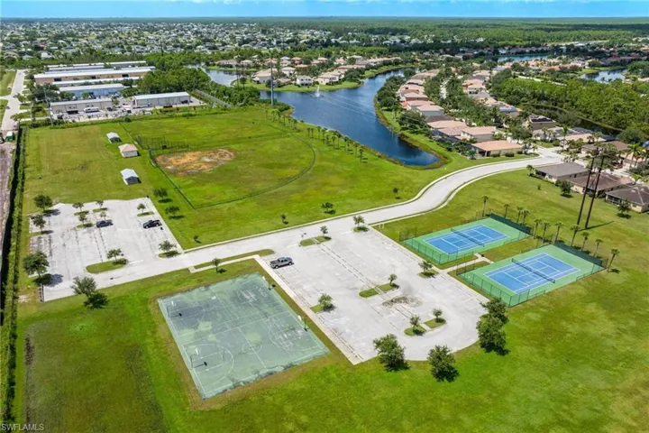 Aerial view of community. Tennis Court and Basketball Court