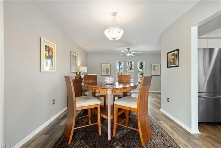 Dining space with a ceiling fan and