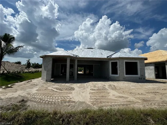 Rear view of property with a patio