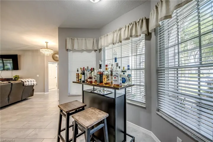Tiled flooring extends through the living area