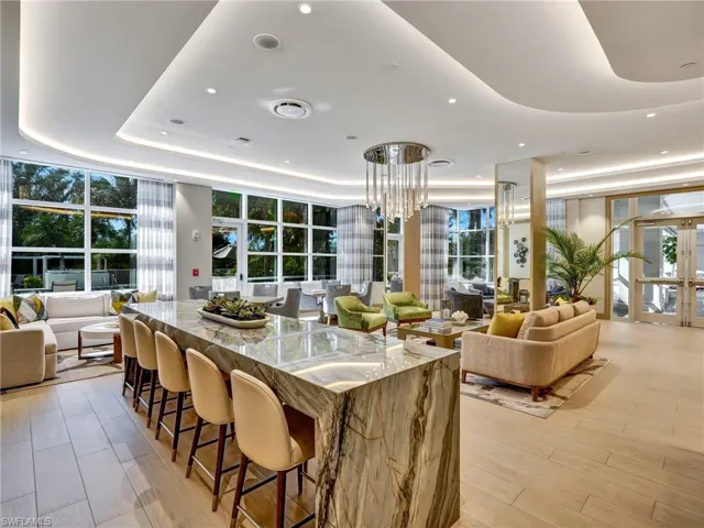 Common area with floor to ceiling windows