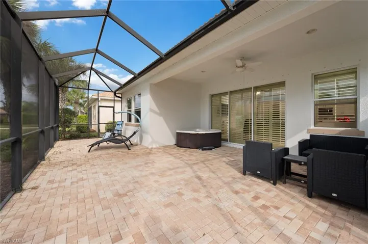 Back Lanai with covered area and sunning area w/hot tub and room for a pool
