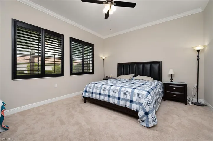 Main bedroom is huge. Lovely plantation shutters.