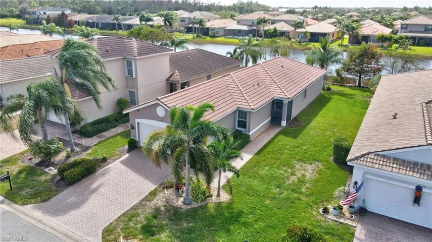 Aerial view of residential area with a large body of water