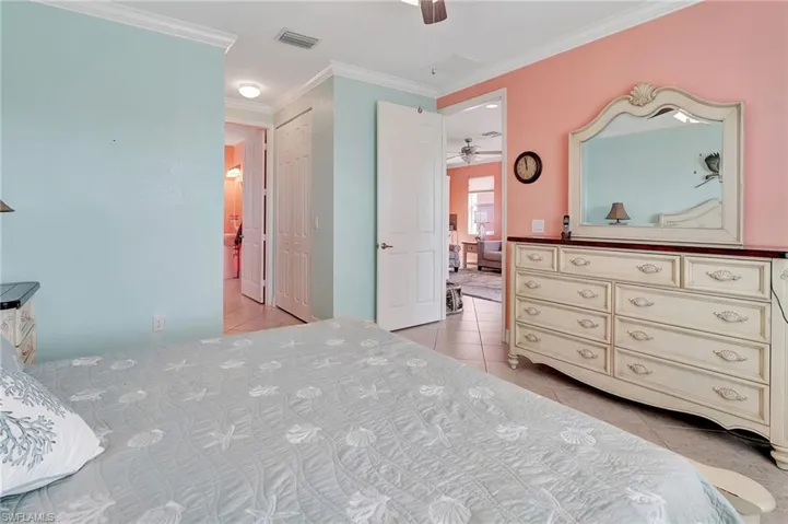 Full bathroom featuring vanity, a shower stall, and tile patterned flooring