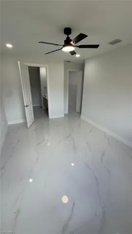Large format tile flooring with subtle veining