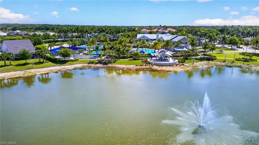 Aerial perspective of suburban area with a large body of water