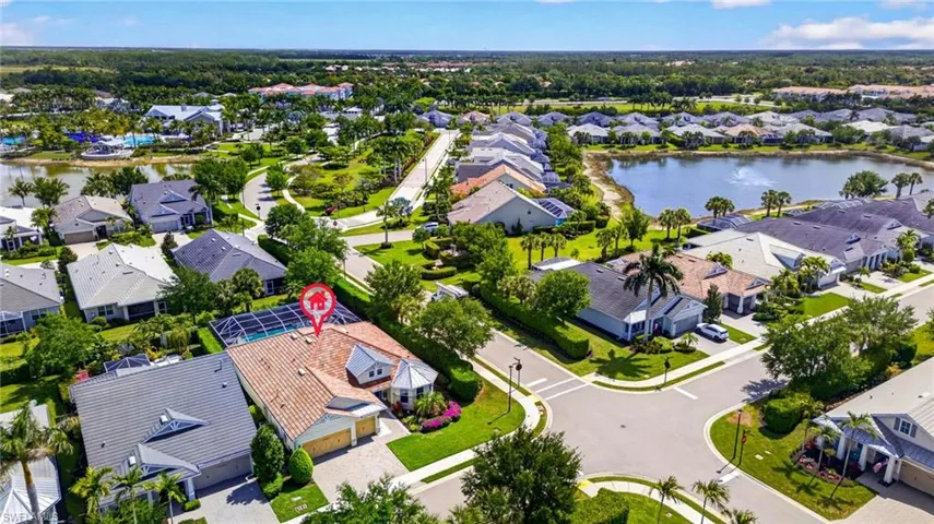 Aerial view of residential area with a large body of water