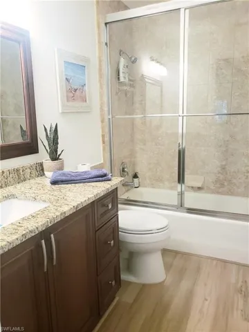 386  Emerald Bay  CIR, Naples, FL 34110