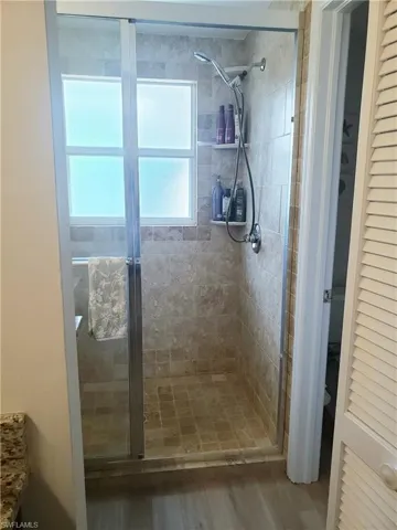 386  Emerald Bay  CIR, Naples, FL 34110