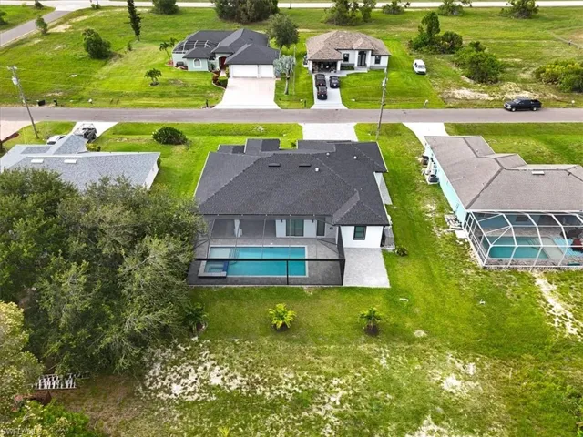 Aerial view of residential area with a pool