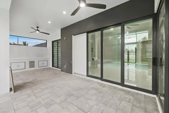 View of patio with ceiling fan