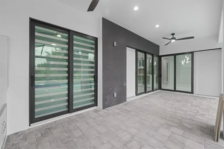 View of patio with ceiling fan