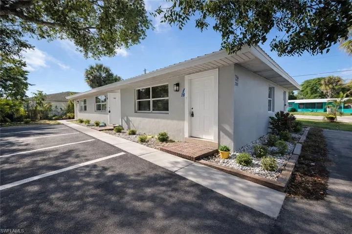 Ranch-style home with stucco siding