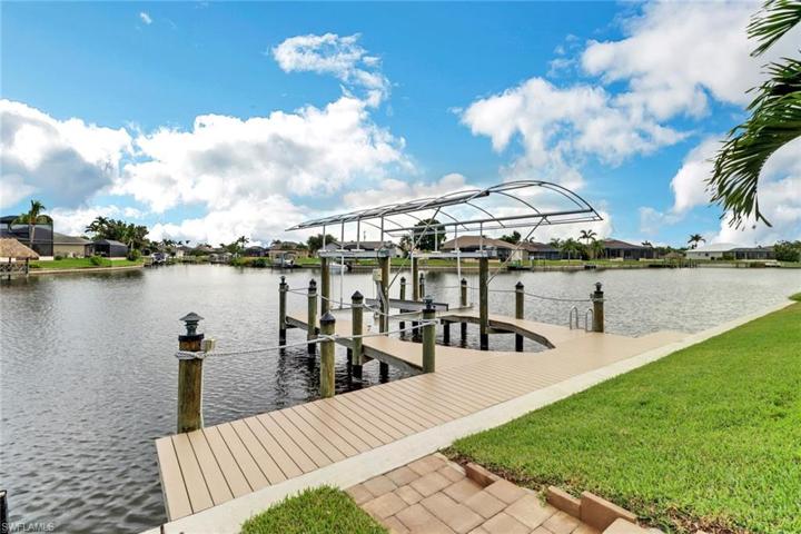 Pavered walk way to Trex Captain's walk and 10k boat lift, canopy, and kayak launch.