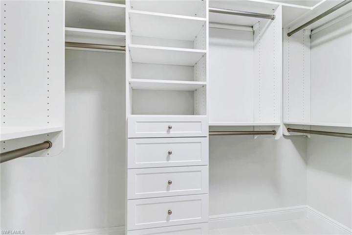 Her walk in custom closet in Owner's suite.