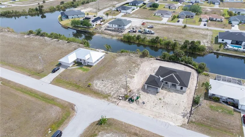 Bird's eye view featuring a residential view and a water view