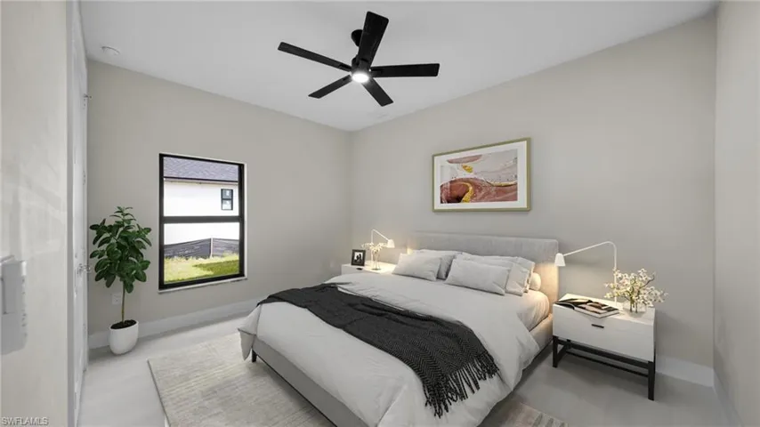 Bedroom with baseboards and a ceiling fan