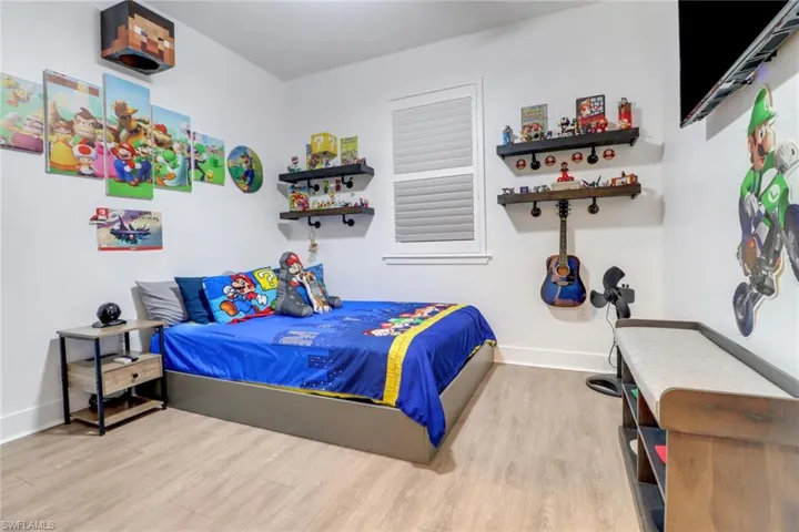 Bedroom with light wood-type flooring