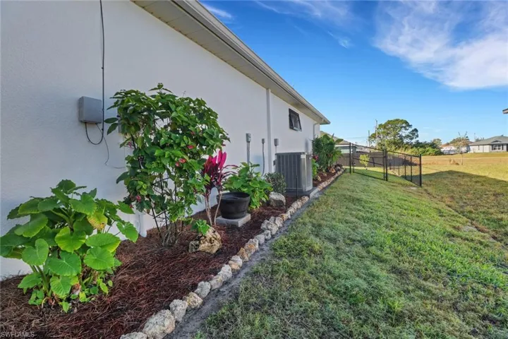 View of yard featuring cooling unit